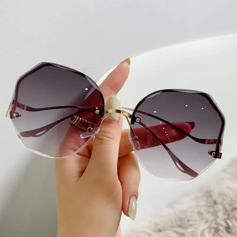 Round Curved Ocean Rimless Sun Glasses