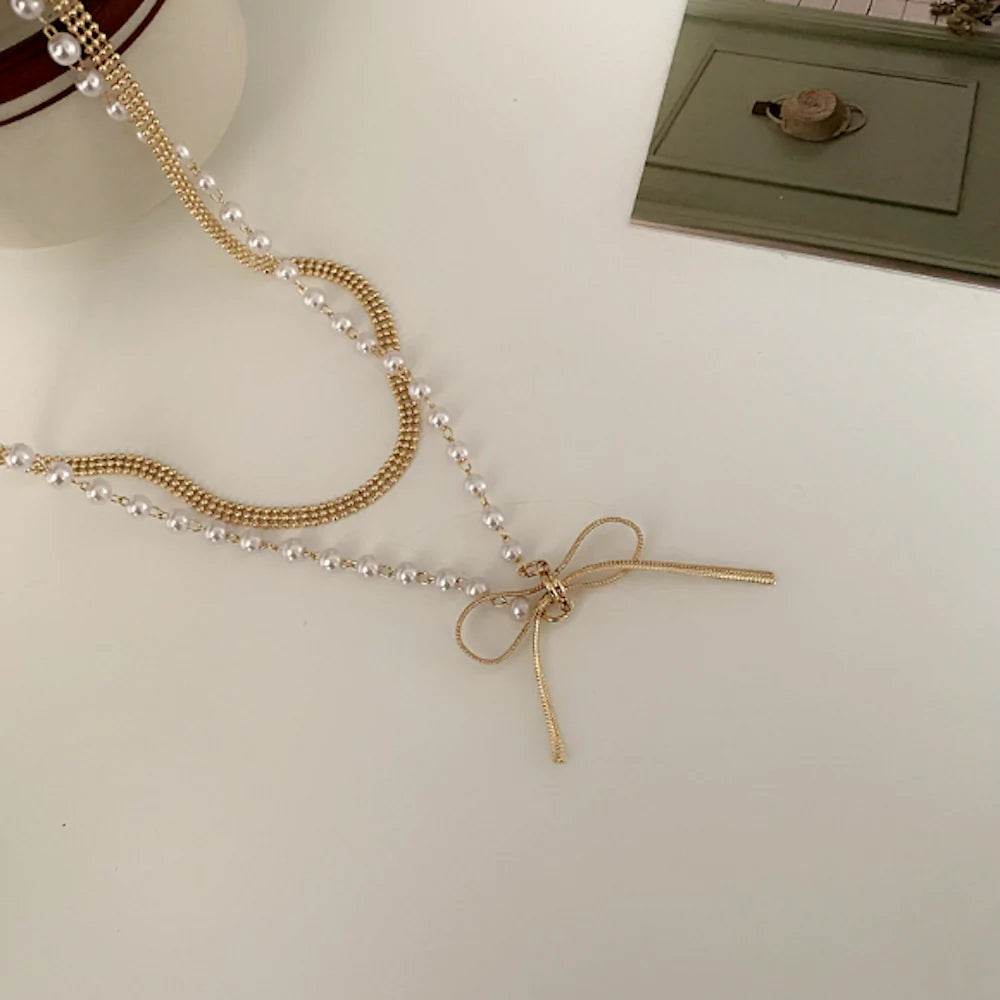 Layered Necklace With A Bow