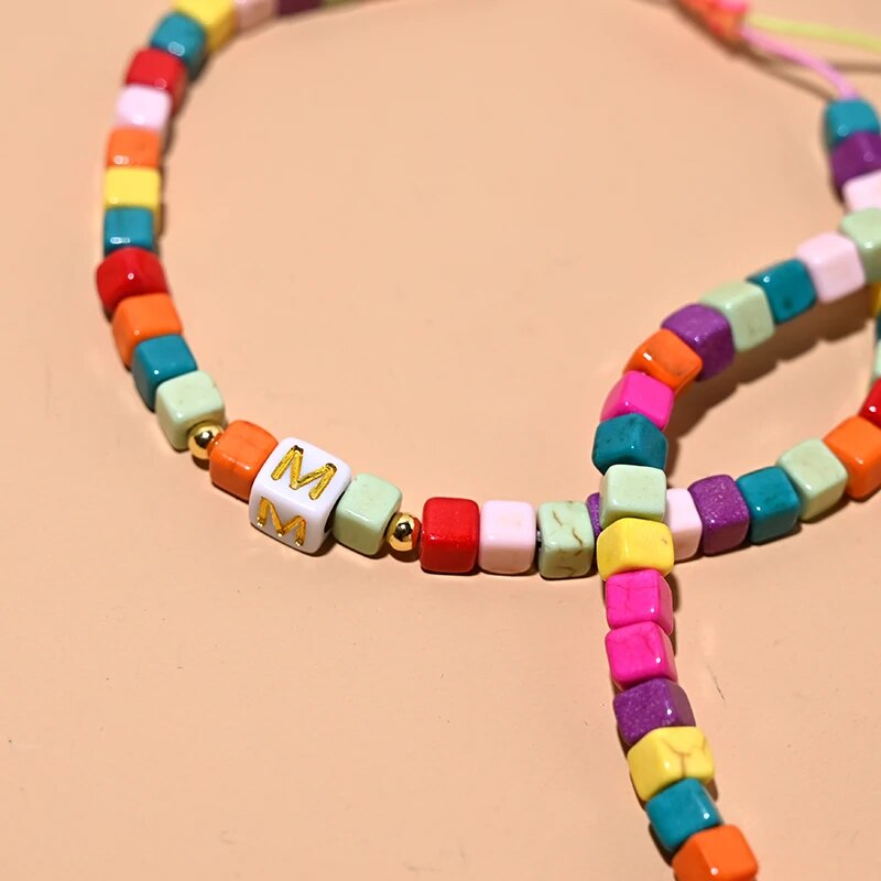 Colorful Initial Anklet Bracelet On The Leg