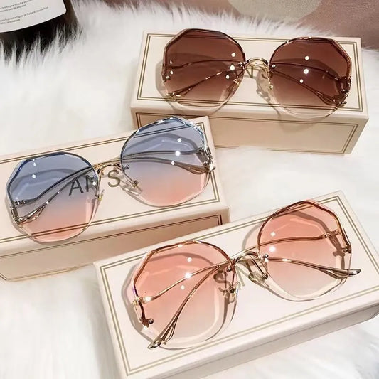 Round Curved Ocean Rimless Sun Glasses