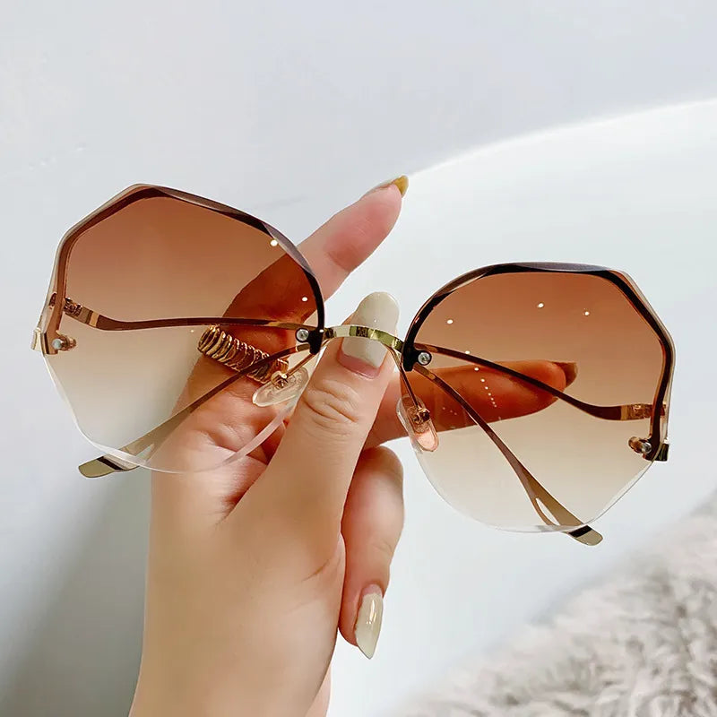 Round Curved Ocean Rimless Sun Glasses