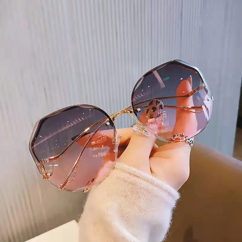 Round Curved Ocean Rimless Sun Glasses