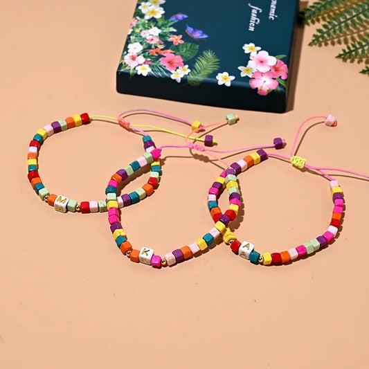 Colorful Initial Anklet Bracelet On The Leg