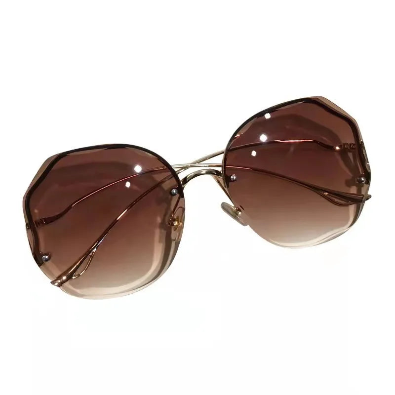 Round Curved Ocean Rimless Sun Glasses